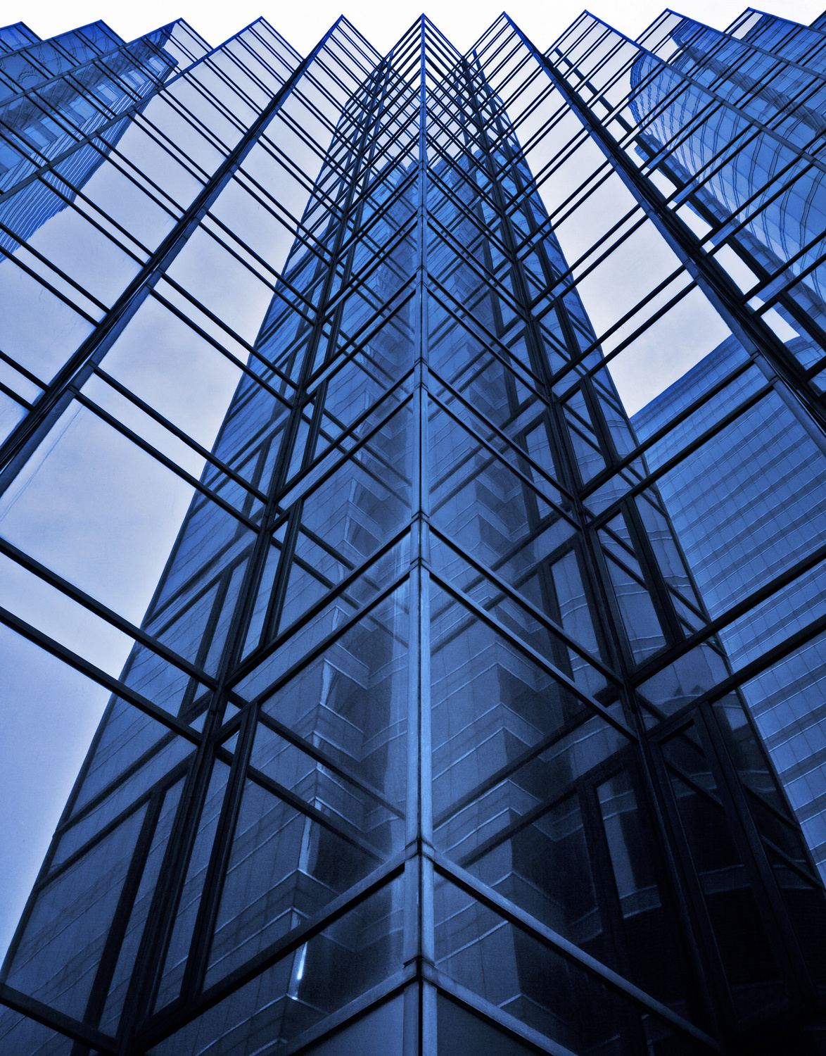A glass facade seen from below