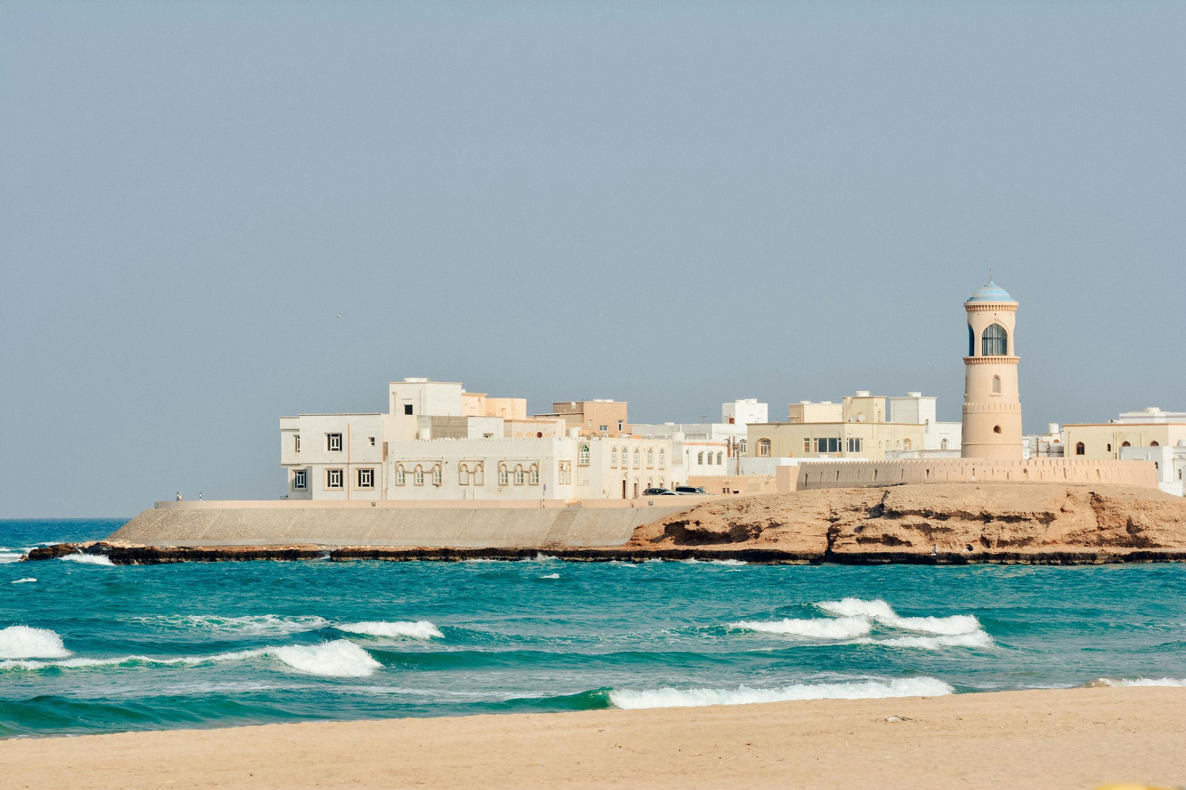 A fort and lighthouse on the Omani coast